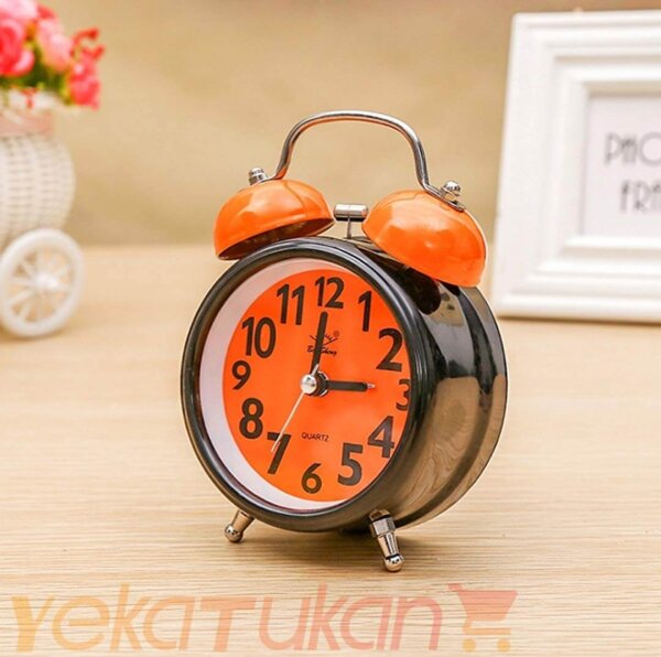ساعت رومیزی زنگ دار صفحه رنگی مدل گرد نارنجی